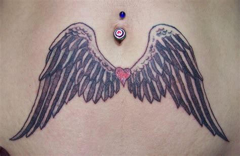 angel tattoo on stomach